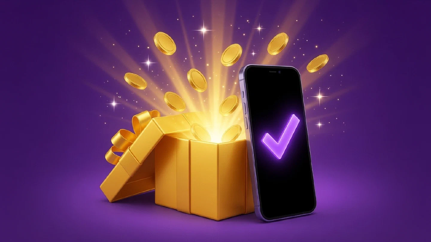 Caja de regalo dorada que se abre sola junto a un celular